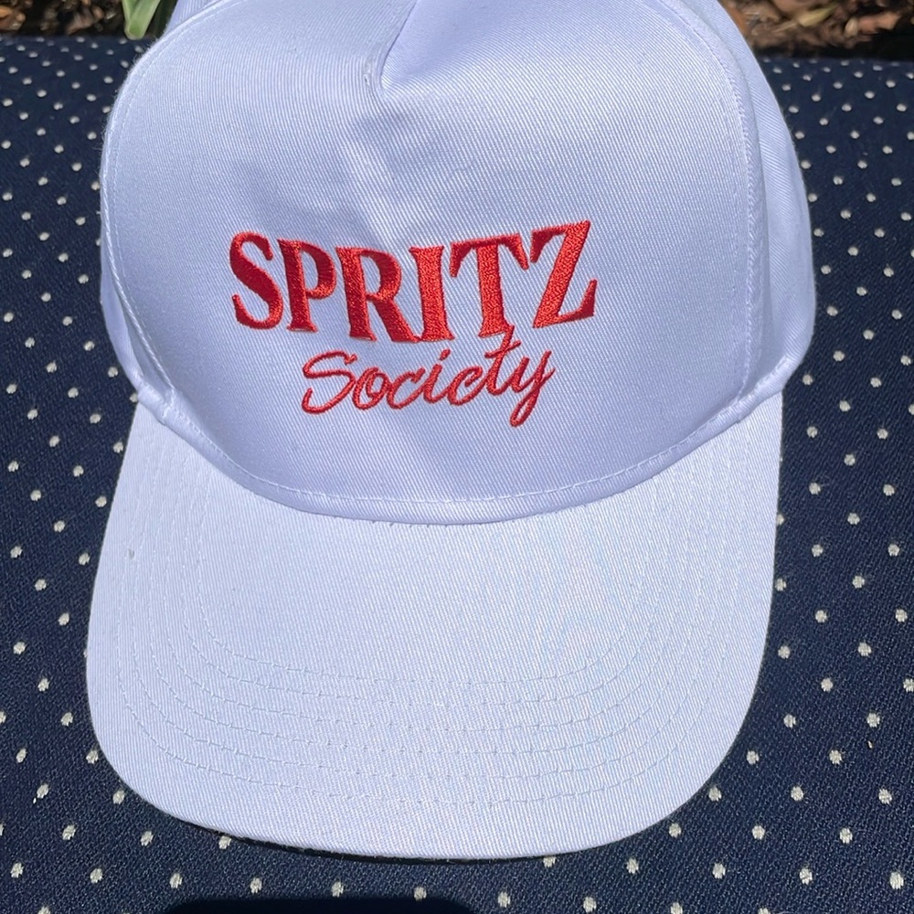 Spritz society white cap.  Pristine condition.   Sold out online.